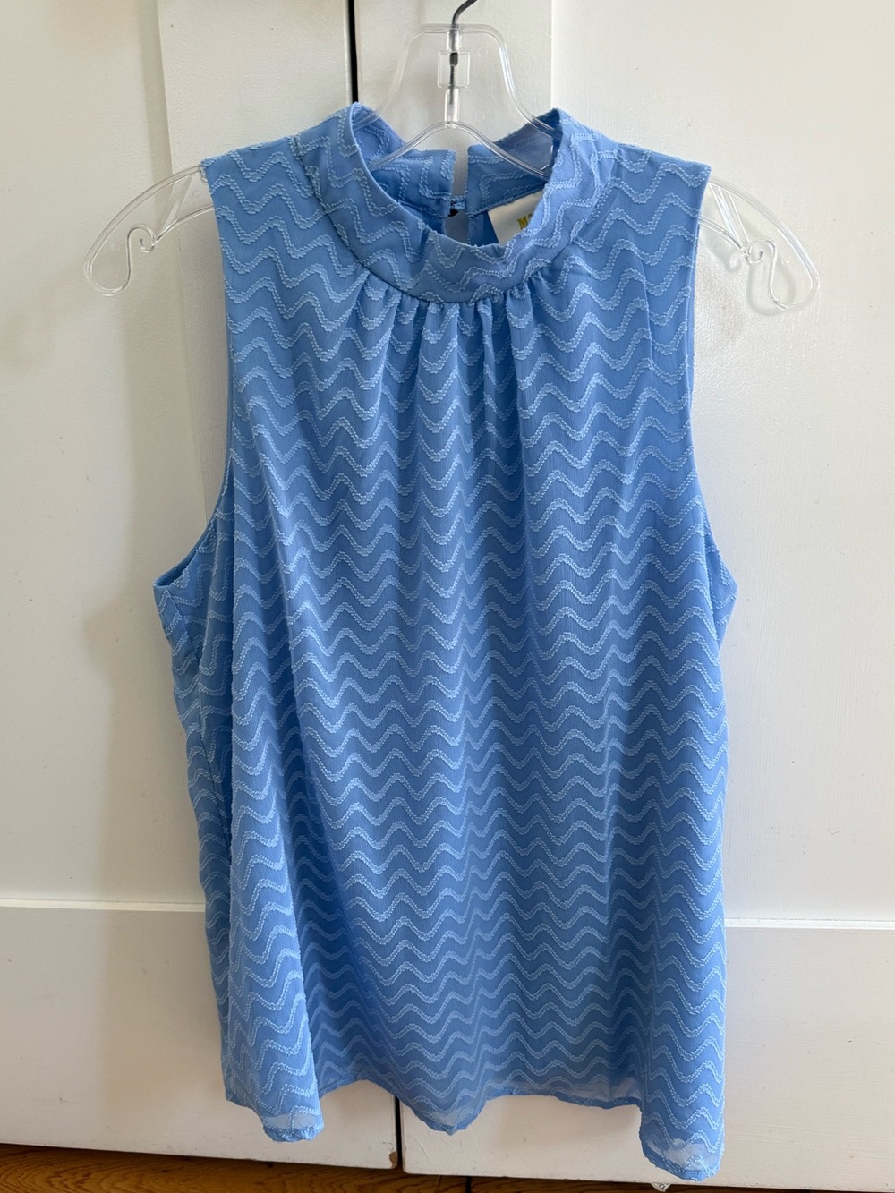 Anthropologie- Maeve Sleeveless light blue mock neck blouse.
